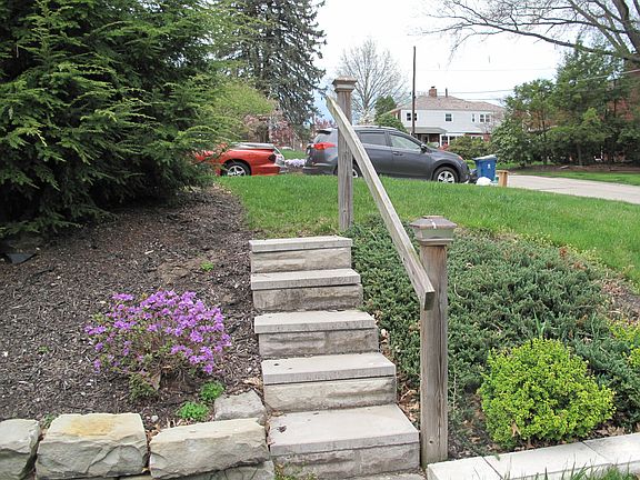 Stone steps from side yard