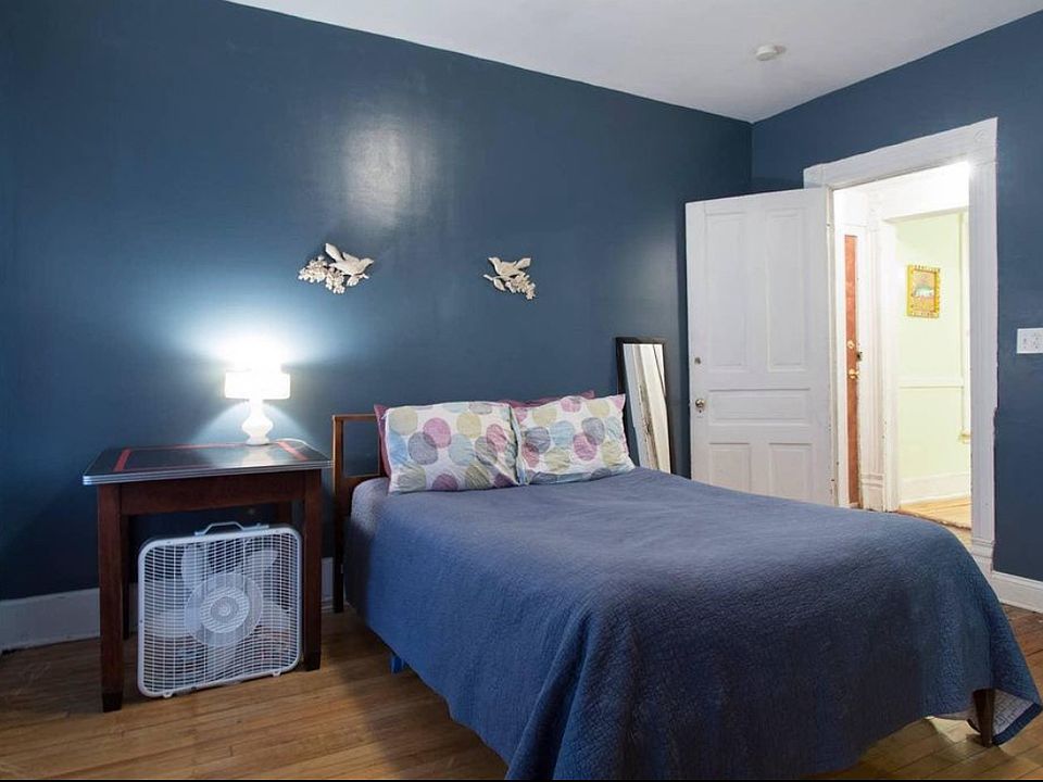 staged photo of bedroom - room has since been painted / renovated