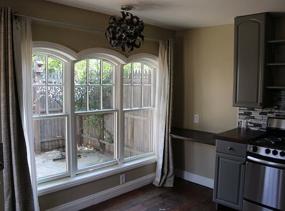 Triple-brow window in open kitchen area