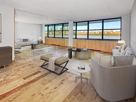 Open Concept Living w/ Over the Hudson River w/ NYC Skyline Views