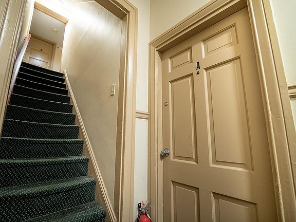 Entrance to Apt A off hallway