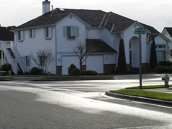 Corner Lot. Two Separate Entrances for main House and Apartment.