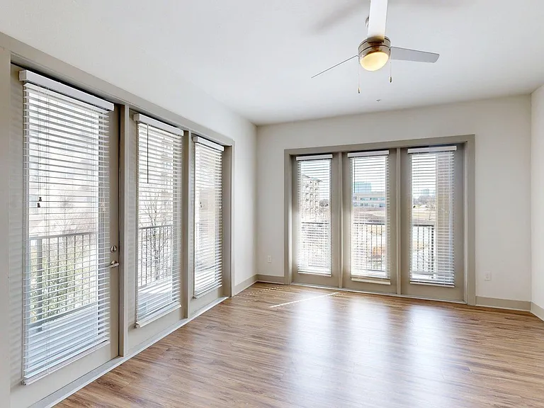 Apartment Living Room with Wood Style Floor and Patio/Balcony.