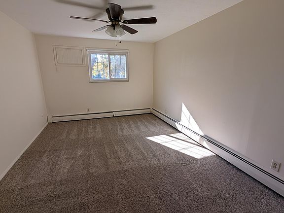Large master bedroom with fresh paint and new flooring