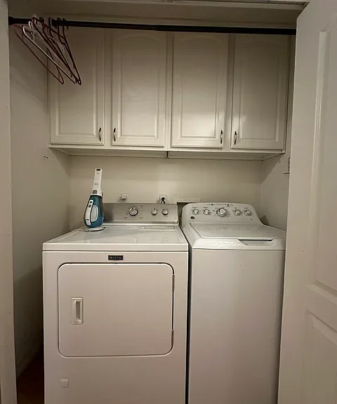 Hallway washer/dryer set up with storage