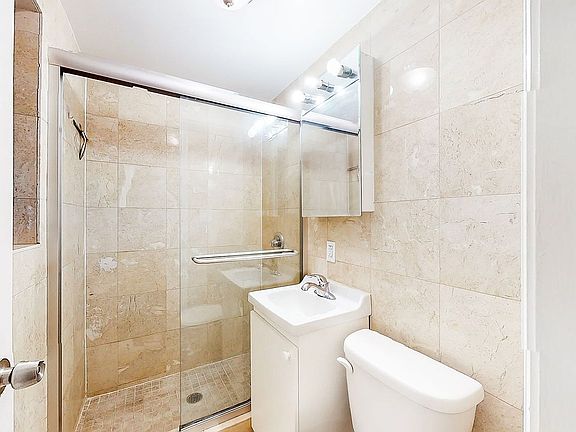 5th image of 216 E 28th St APT 2D