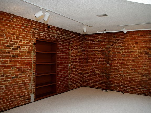 living room exposed brick
