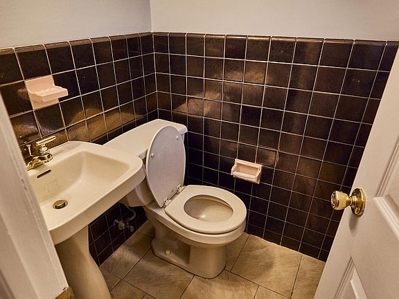 Powder room upon entering house