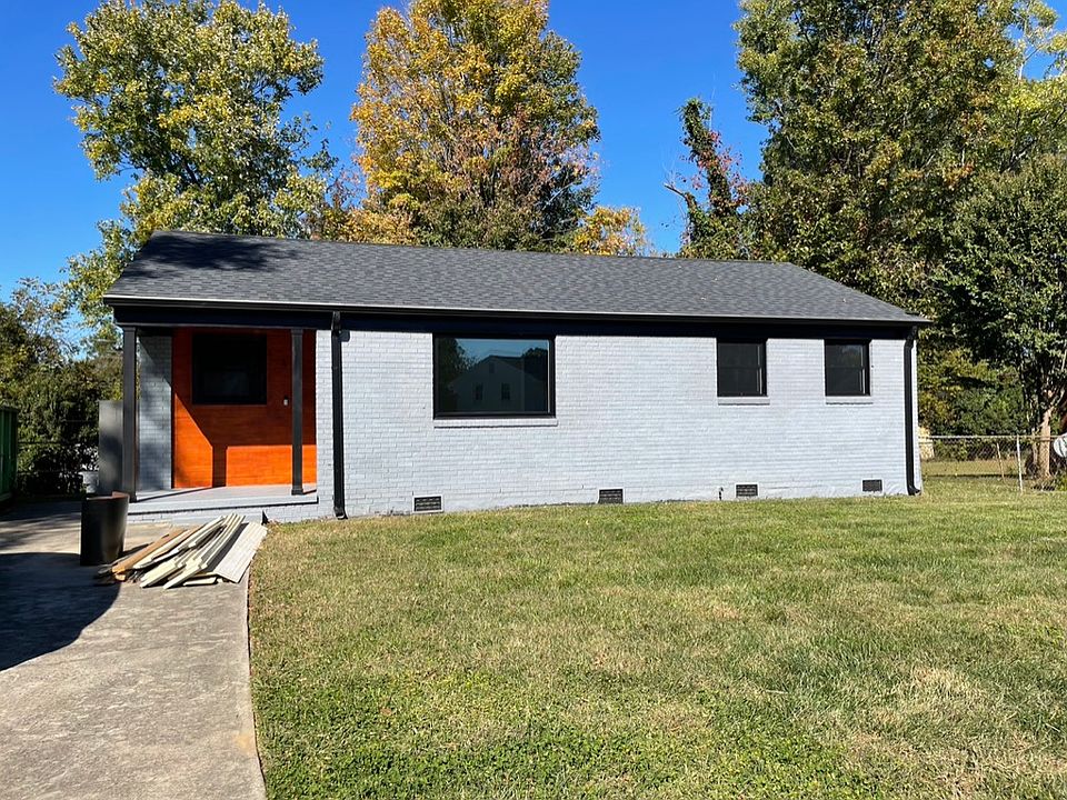 Newly renovated brick, hardy board siding and wood accents. Recently installed ventilated roof and leaf guard filters on gutters along with new oversized downspouts.