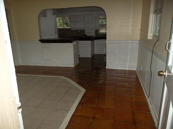 Looking toward kitchen from front entrance.