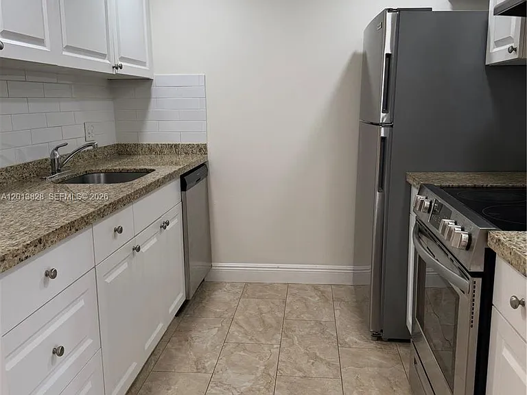 1551 SW 135th Ter #311G — Photo 3
