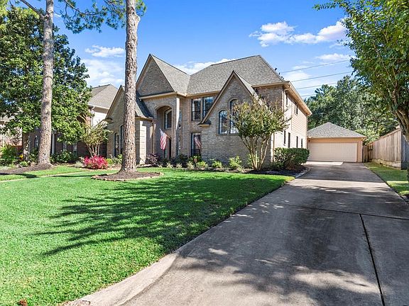 The extra long driveway leaves plenty of room for extra parking and leads you to your 2 car detached garage.