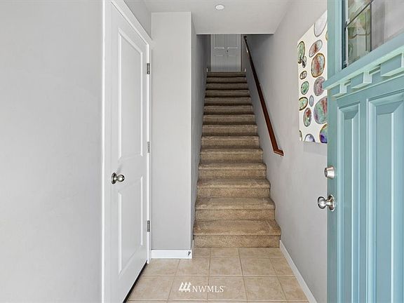 **Photo is of Unit I-104 - Colors and materials may vary slightly**