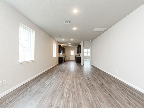Family Room to Dining Area and Kitchen