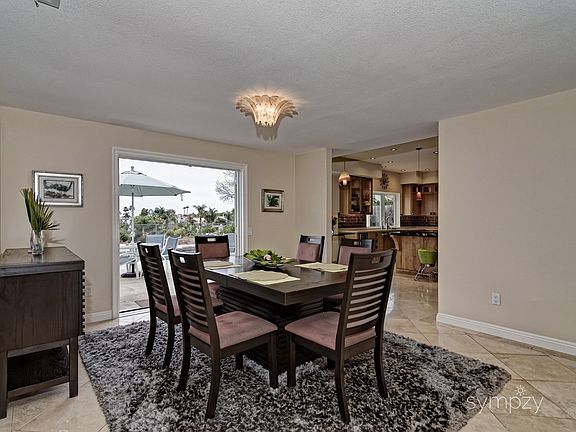 Dining Room that looks out to pool area.