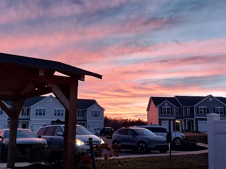 Outside view, parking lot area by mailbox