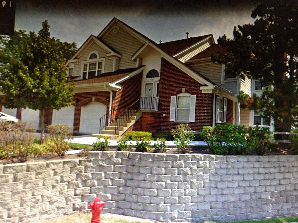 Lovely outdoor shot of 2 story corner unit!