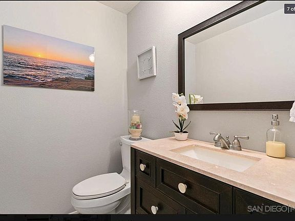 The conveniently located powder room on the main living area offers convenience at home and when entertaining guests. It maintains peace and privacy by keeping the downstairs bedrooms peaceful and private.