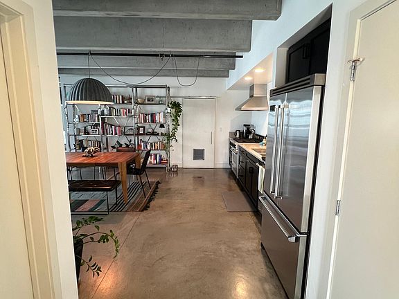 Entryway with second bathroom on the left and large hall closet