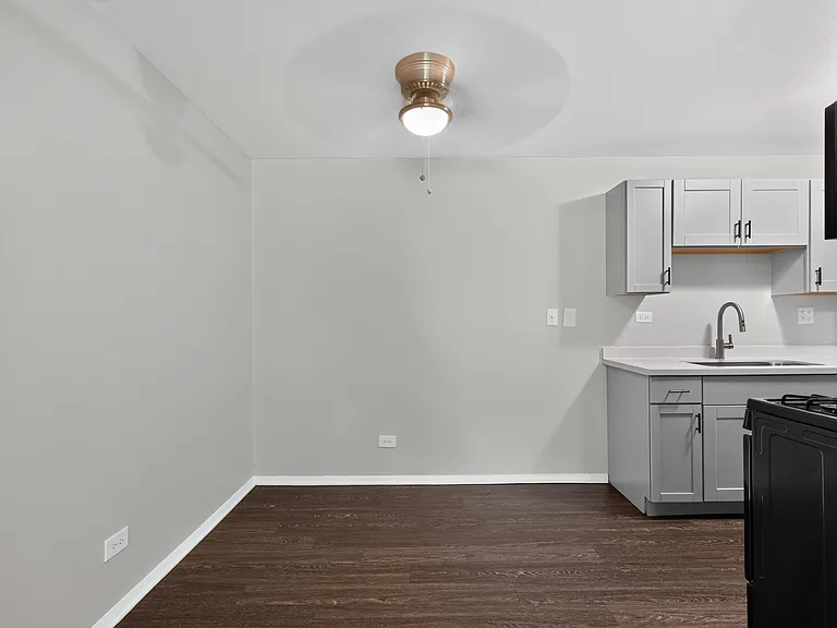 Enjoy a bright, open dining space featuring a ceiling fan at Renaissance at Carol Stream in Carol Stream, IL.