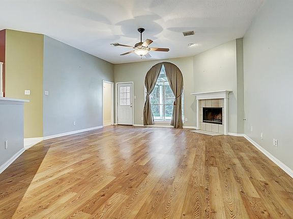 **BEFORE PHOTO** Open Concept Living Room allowing for a great flow throughout home and easy access to back yard.