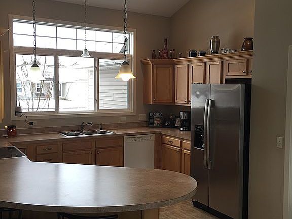 Kitchen w/ large windows