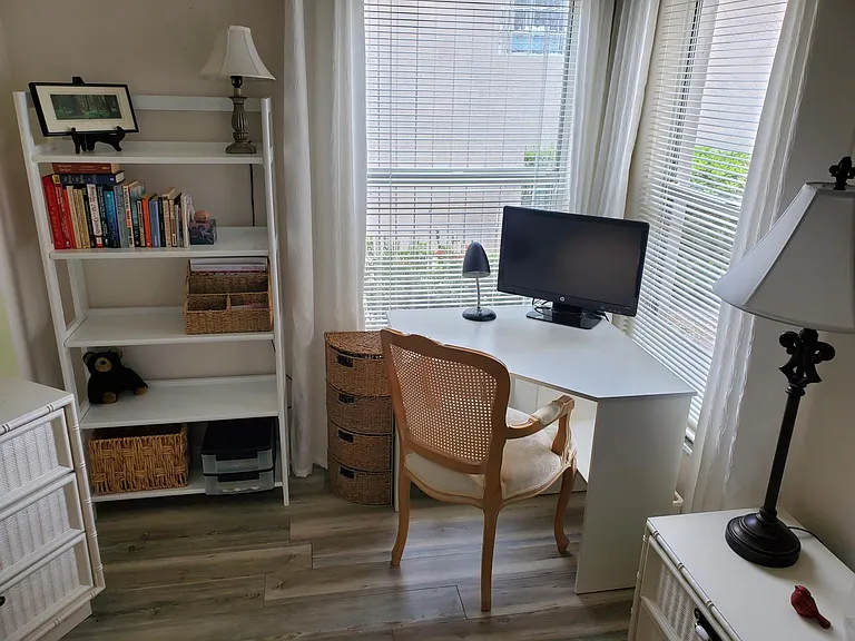 Den area/ office with computer monitor you can use + twin sleeper sofa
