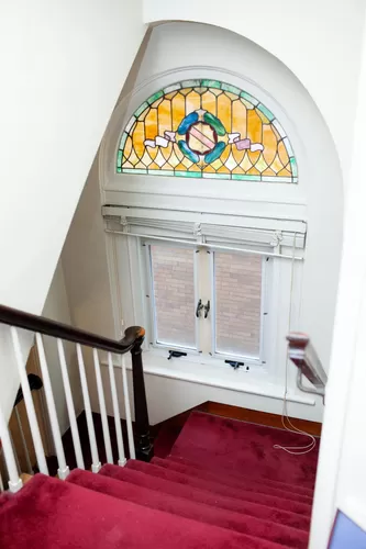 Beautiful stained glass window in the stairway. - 315 Suncrest St