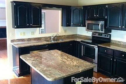 Updated granite counters and stainless appliances. Hardwood on first floor.