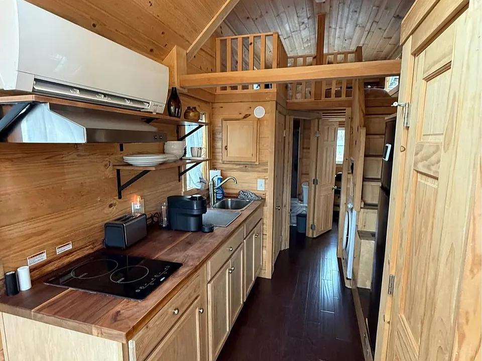 Kitchen area with under cabinet storage and room to prepare meals