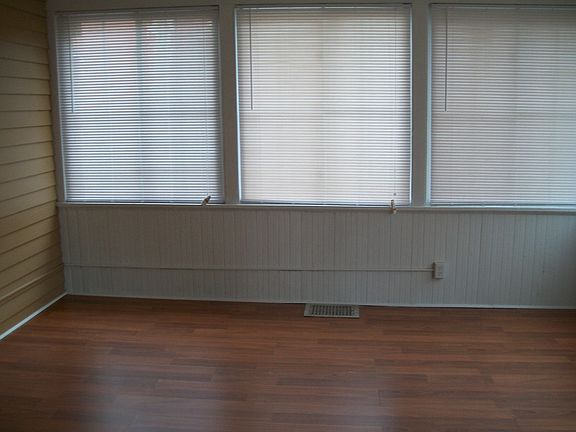 Enclosed Porch leads out to back deck.