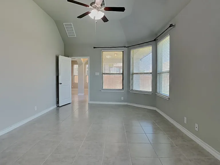 Brightly lit, spacious room wi