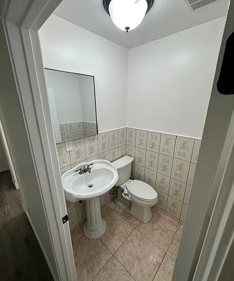 Half Bathroom located in Main Hallway