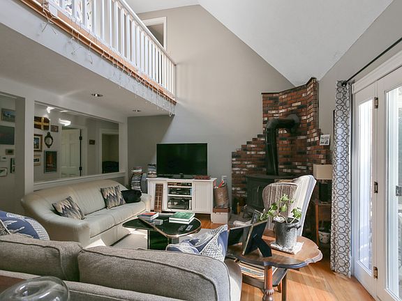Living Room and Fireplace with loft