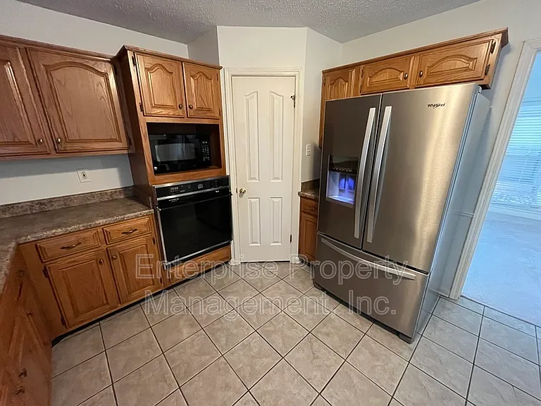 6700 N Kirby Oaks Cv — Photo 16