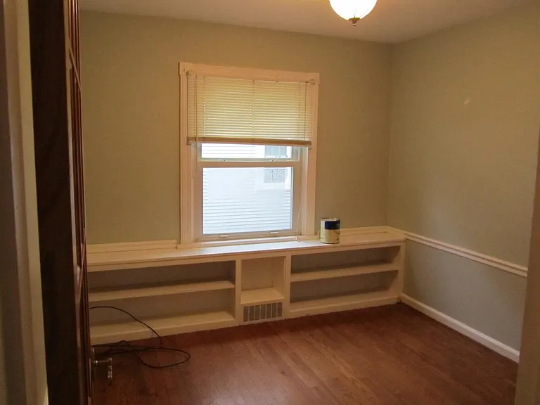 Built-in bookshelves in third bedroom