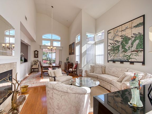 Living room and dining area with fireplace