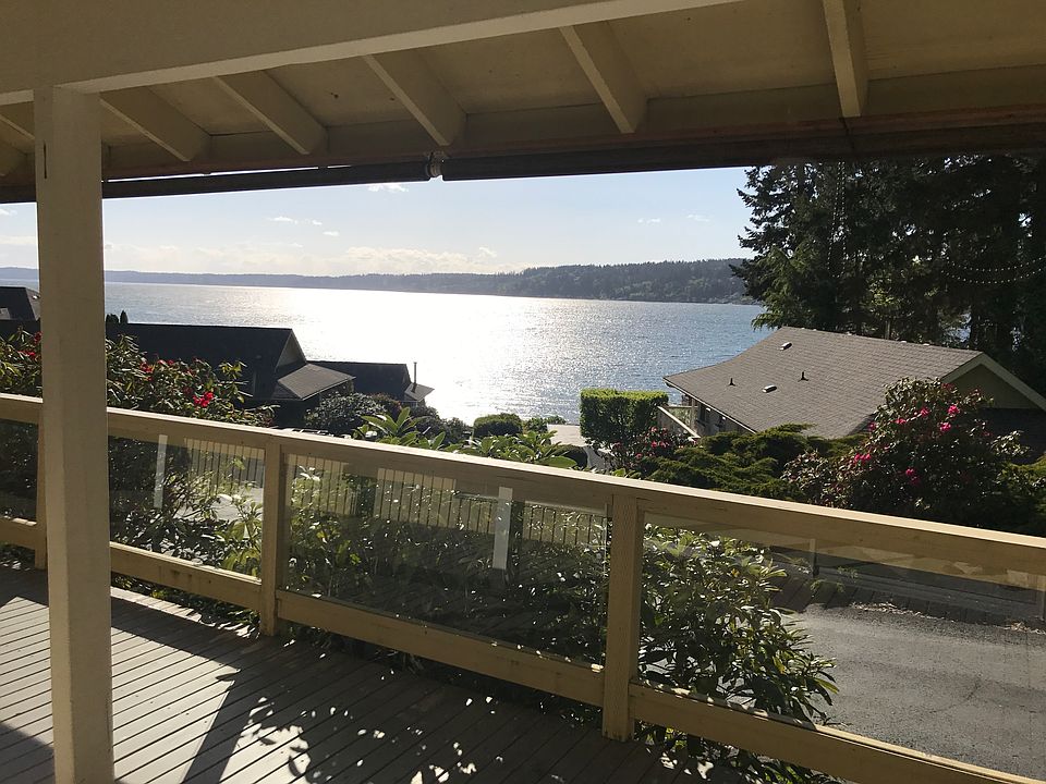 Covered deck allows for enjoyment of view of Henderson Bay
