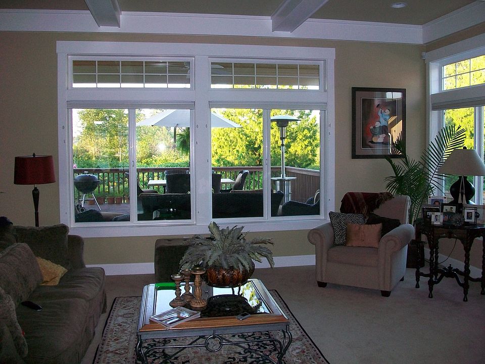 Living room overlooking huge deck - great for entertaining!
