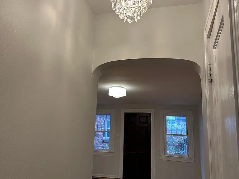 Original arches and upgradeted lighting makes this home special