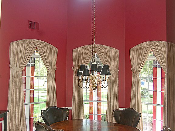 Gorgeous two story formal dining room