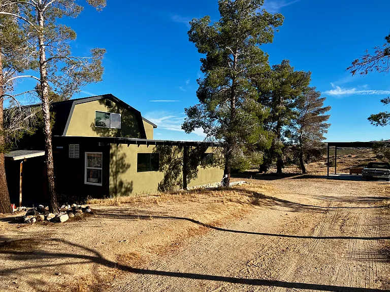 view of the building and the carport
