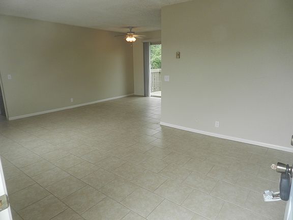 Large, open living room, all tile