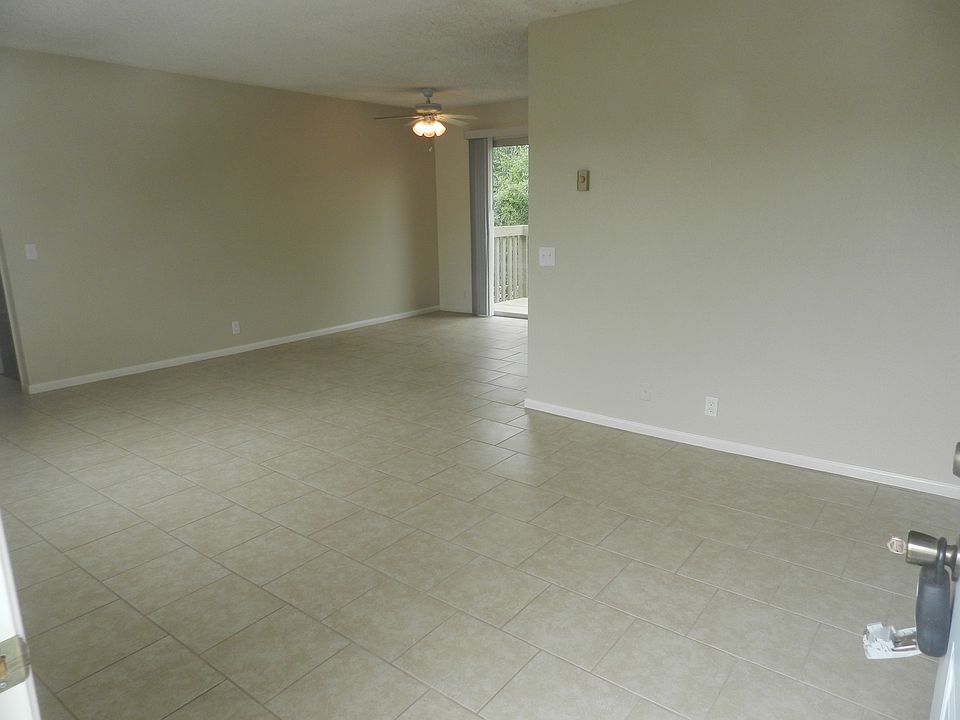 Large, open living room, all tile