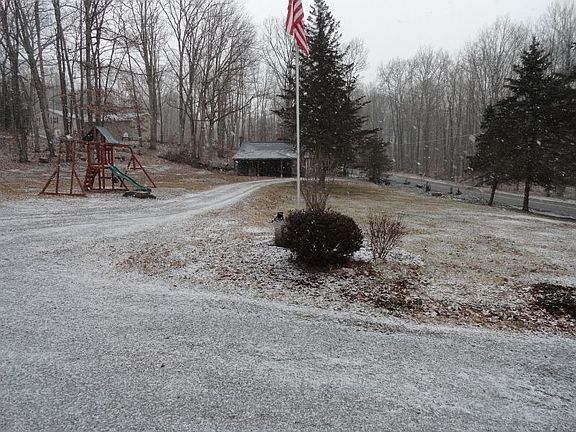 1/2 of the yard and detached garage