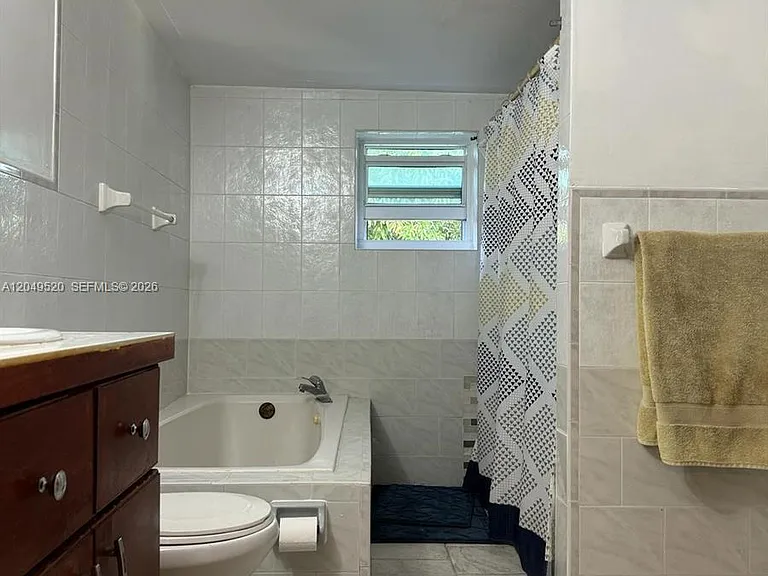 225 NE 175th Ter #A — Photo 17