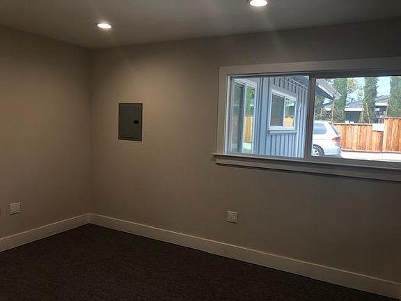 another room looking out the back parking lot