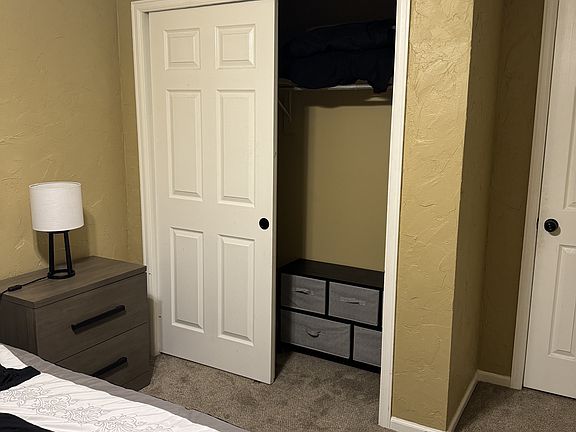 closet has a dresser for extra space