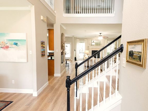 two-story foyer with abundant natural light