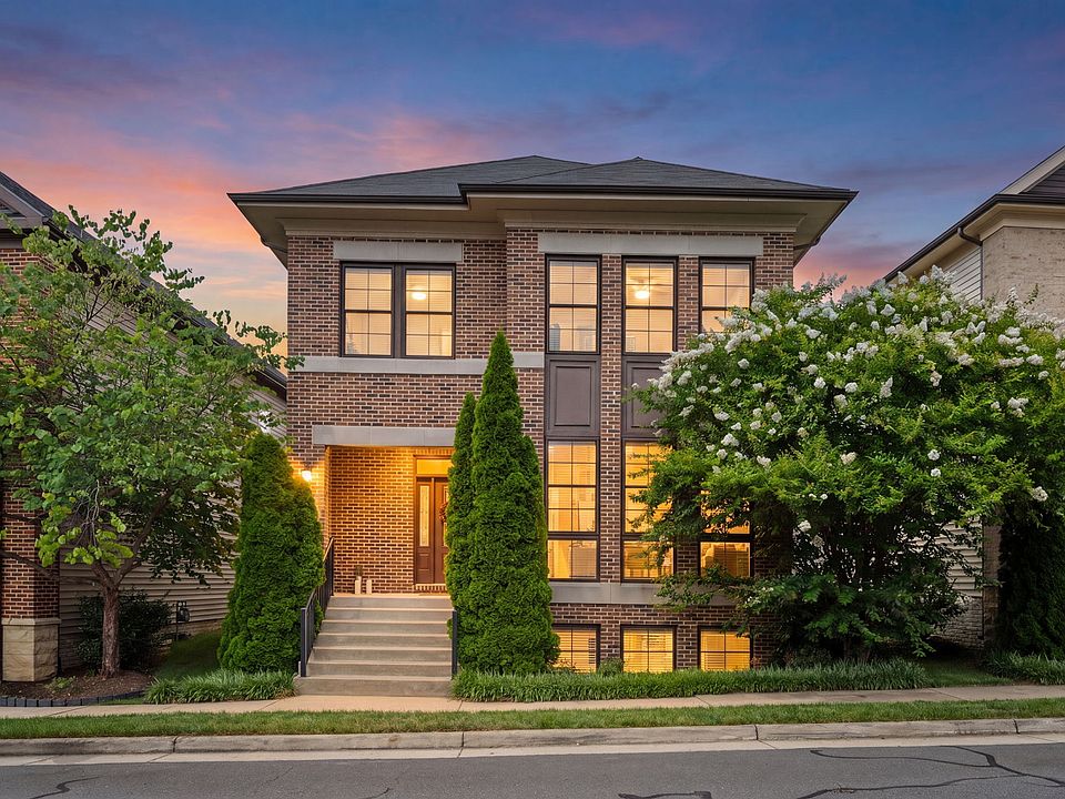 Front Elevation with lots of guest parking on front of home.